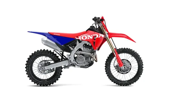 Enduro bike Honda CRF250RX from the side with hand guards on the handlebar